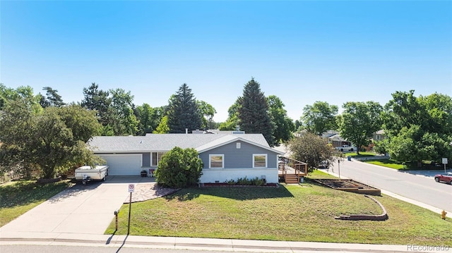 7780 S Kendall Blvd, Littleton, CO 80128 - ranch-style house featuring driveway, an attached garage, and a front yard