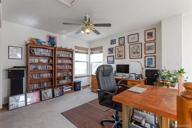 office area with ceiling fan and light colored carpet