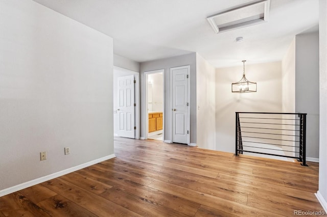 empty room featuring hardwood / wood-style floors