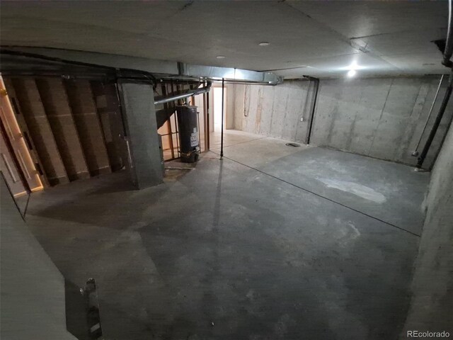 894 S Krameria St, Denver, CO 80224 - unfinished basement with gas water heater