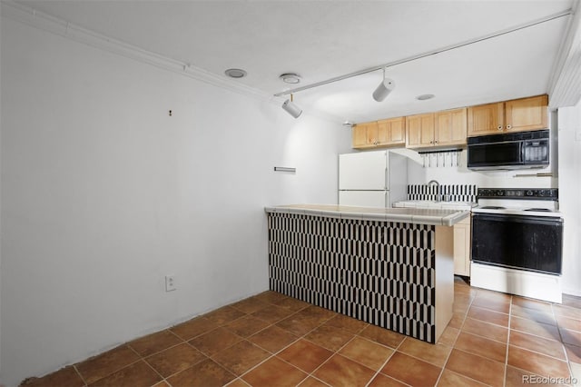 kitchen featuring ornamental molding, white appliances, light brown cabinets, dark tile patterned flooring, and tile counters