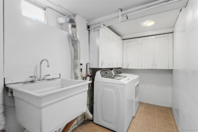 laundry room with sink and washing machine and clothes dryer