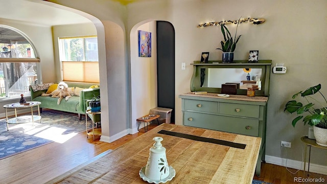 sitting room featuring hardwood / wood-style flooring and plenty of natural light