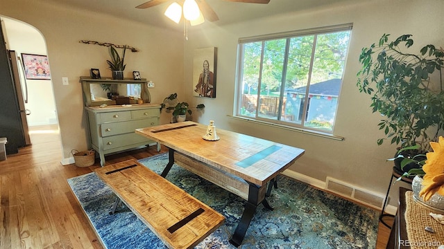 dining space featuring ceiling fan and light hardwood / wood-style floors