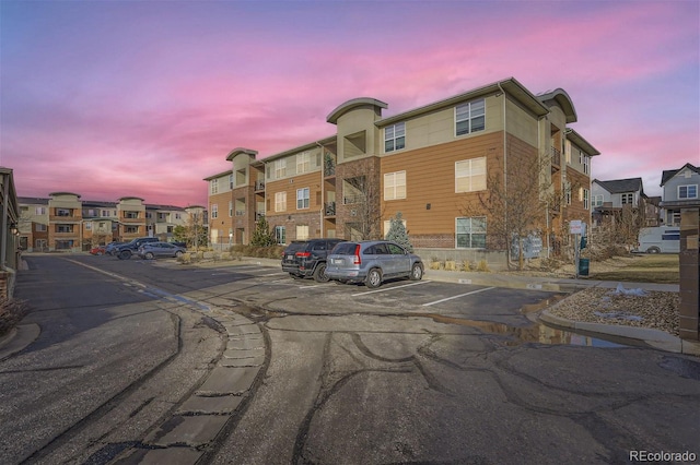 view of outdoor building at dusk