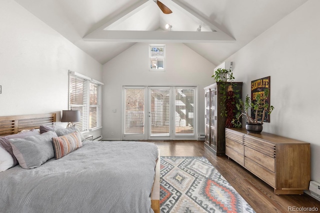 bedroom featuring a ceiling fan, a baseboard radiator, wood finished floors, access to exterior, and high vaulted ceiling