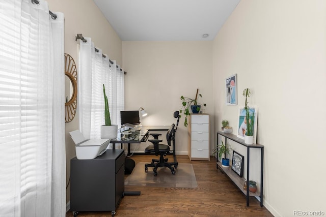 office space featuring wood finished floors and baseboards