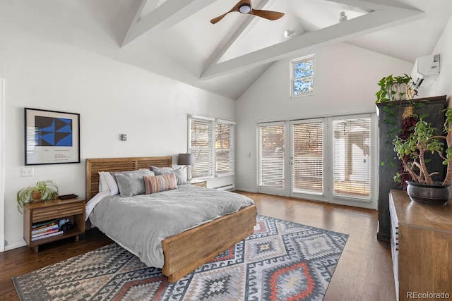 bedroom with high vaulted ceiling, a wall mounted AC, wood finished floors, and access to exterior