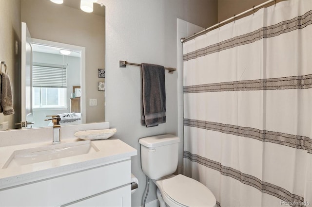 6737 S Tempe Ct, Aurora, CO 80016 - full bathroom featuring ensuite bathroom, vanity, toilet, and a shower with curtain