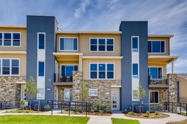 6737 S Tempe Ct, Aurora, CO 80016 - view of building exterior with central air condition unit
