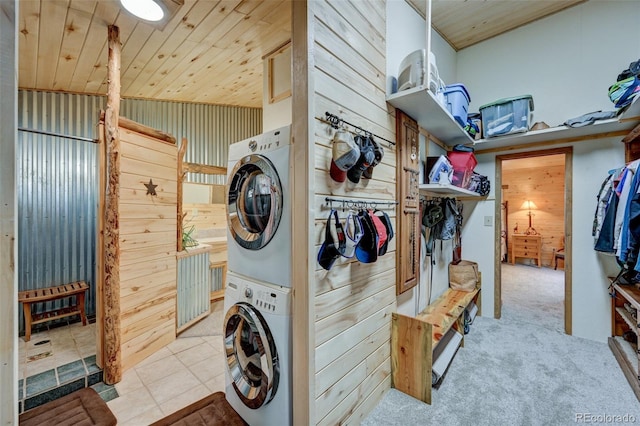 24700 US Highway 285, Buena Vista, CO 81211 - washroom with stacked washer and clothes dryer and tile patterned floors