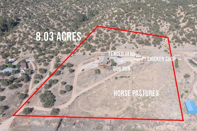 24700 US Highway 285, Buena Vista, CO 81211 - aerial view of sparsely populated area with property boundaries highlighted and a desert landscape