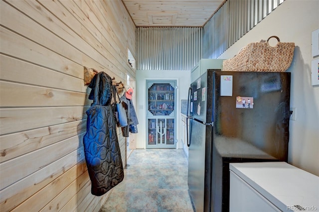 24700 US Highway 285, Buena Vista, CO 81211 - hall featuring wooden walls and concrete flooring