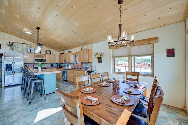 24700 US Highway 285, Buena Vista, CO 81211 - dining space with a chandelier, wood ceiling, and lofted ceiling