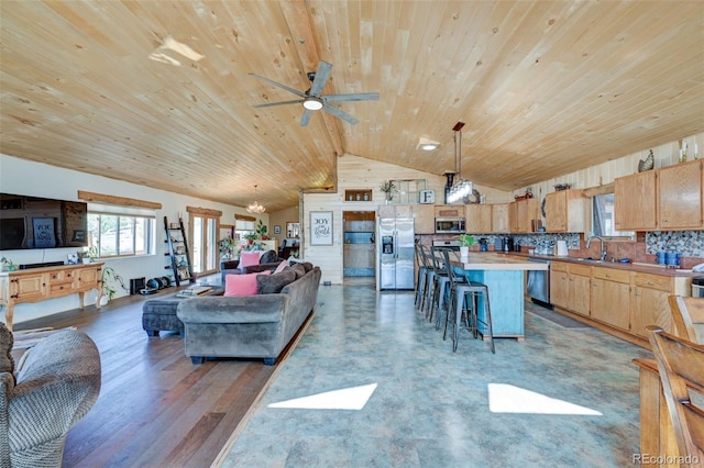 24700 US Highway 285, Buena Vista, CO 81211 - living area with wood ceiling, lofted ceiling, ceiling fan, and light wood-style flooring
