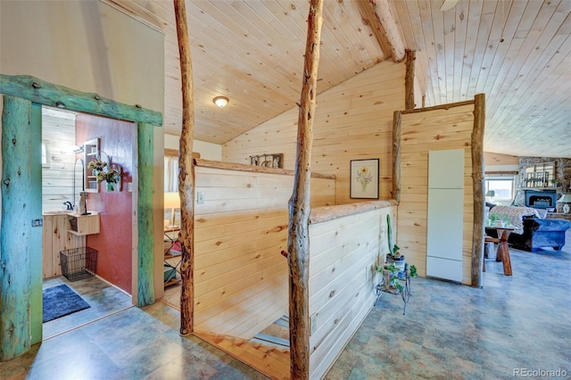 24700 US Highway 285, Buena Vista, CO 81211 - corridor featuring wooden walls, wooden ceiling, and concrete floors