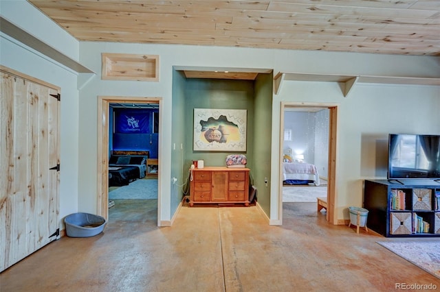 24700 US Highway 285, Buena Vista, CO 81211 - hallway with finished concrete flooring and wood ceiling