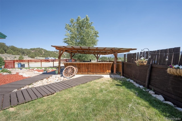 24700 US Highway 285, Buena Vista, CO 81211 - fenced backyard with a pergola