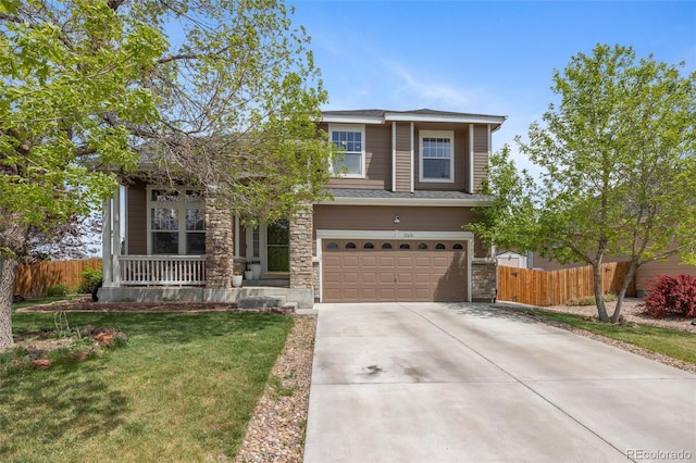 view of front of property featuring covered porch, a garage, and concrete driveway
