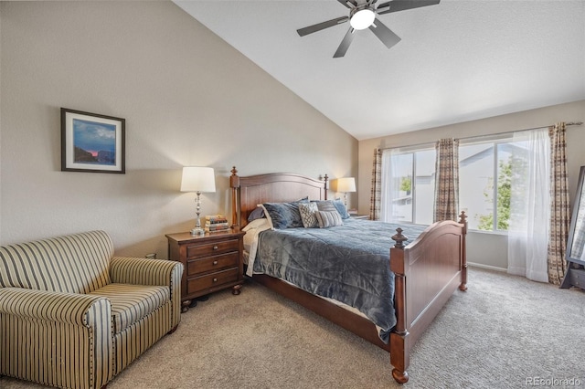 bedroom featuring lofted ceiling, carpet floors, baseboards, and a ceiling fan