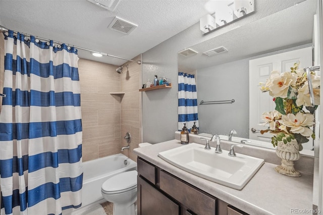 full bath with toilet, a textured ceiling, shower / tub combo with curtain, and vanity