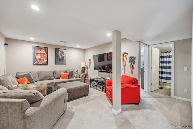 living area featuring carpet flooring, recessed lighting, and baseboards