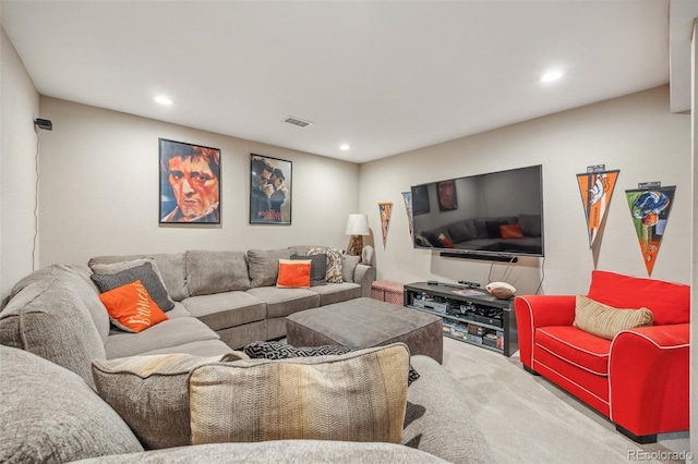 carpeted living room with recessed lighting