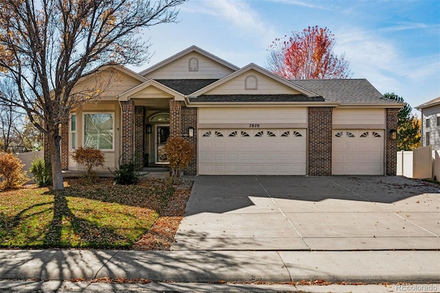 single story home with a garage