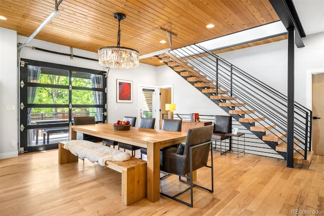 2669 N Cherry St, Denver, CO 80207 - dining area with wood ceiling, stairway, light wood-type flooring, a chandelier, and recessed lighting