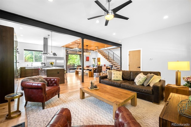2669 N Cherry St, Denver, CO 80207 - living room featuring ceiling fan, stairs, light wood finished floors, and recessed lighting