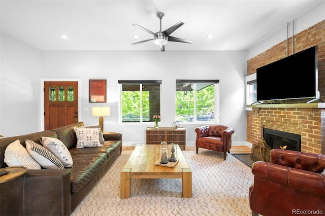 2669 N Cherry St, Denver, CO 80207 - living area featuring a brick fireplace, ceiling fan, baseboards, and recessed lighting