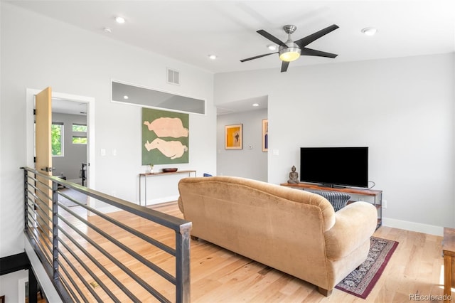 2669 N Cherry St, Denver, CO 80207 - living room featuring light wood finished floors, a ceiling fan, recessed lighting, and vaulted ceiling