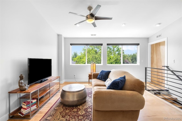 2669 N Cherry St, Denver, CO 80207 - living room featuring baseboards, light wood-style flooring, ceiling fan, and recessed lighting