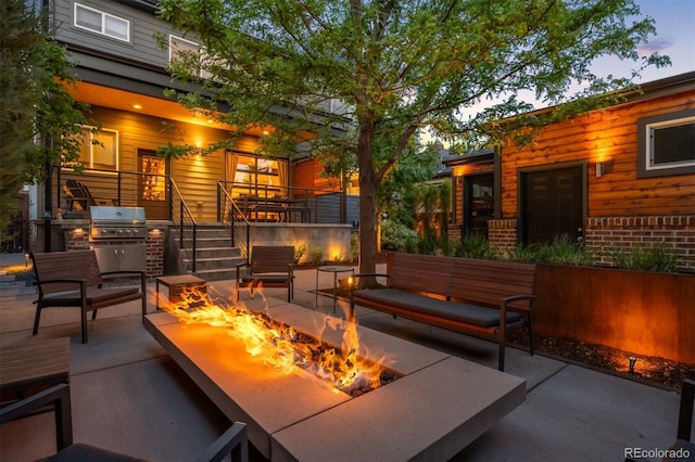 2669 N Cherry St, Denver, CO 80207 - view of patio / terrace with an outdoor living space with a fire pit, stairway, and area for grilling