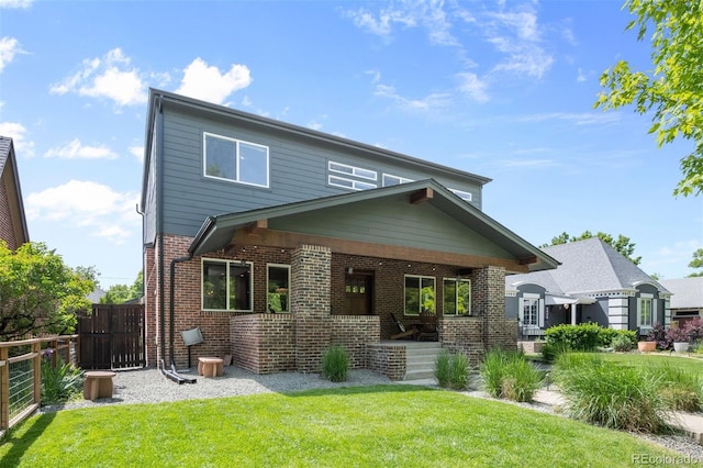 2669 N Cherry St, Denver, CO 80207 - view of front facade with covered porch and brick siding