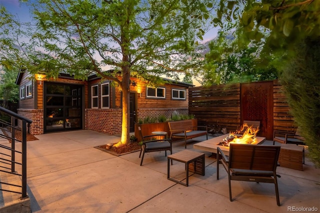 2669 N Cherry St, Denver, CO 80207 - view of patio featuring an outdoor living space with a fire pit
