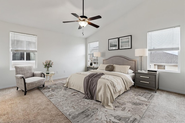 bedroom featuring vaulted ceiling, ceiling fan, baseboards, and light colored carpet