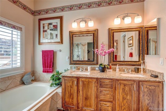 10292 Nickolas Ave, Highlands Ranch, CO 80130 - full bathroom with a bath and double vanity