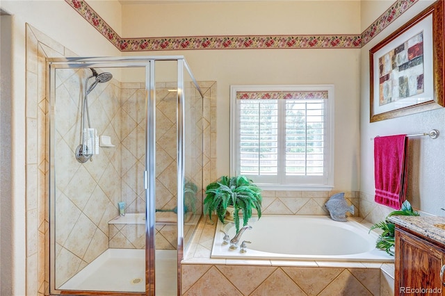10292 Nickolas Ave, Highlands Ranch, CO 80130 - bathroom with a bath, a stall shower, and vanity