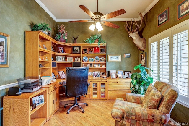 10292 Nickolas Ave, Highlands Ranch, CO 80130 - office space featuring light wood-type flooring, a ceiling fan, ornamental molding, and built in study area