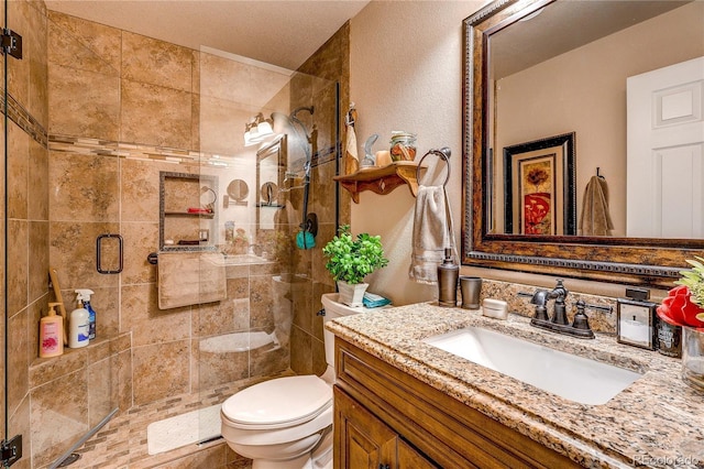 10292 Nickolas Ave, Highlands Ranch, CO 80130 - bathroom featuring vanity, a shower stall, and a textured wall