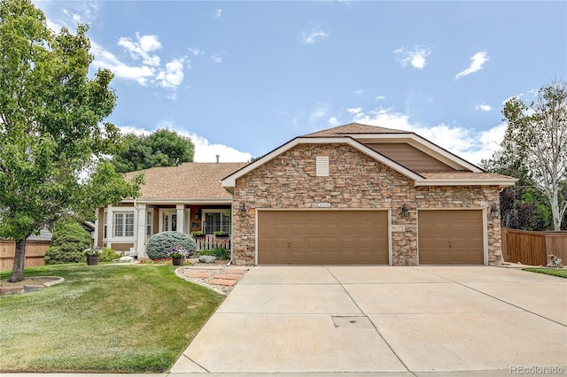 10292 Nickolas Ave, Highlands Ranch, CO 80130 - craftsman-style home featuring a garage, concrete driveway, and stone siding