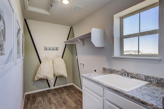 bathroom featuring vanity and hardwood / wood-style floors