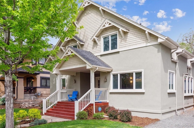 1526 S Gaylord St, Denver, CO 80210 - view of front facade featuring stucco siding
