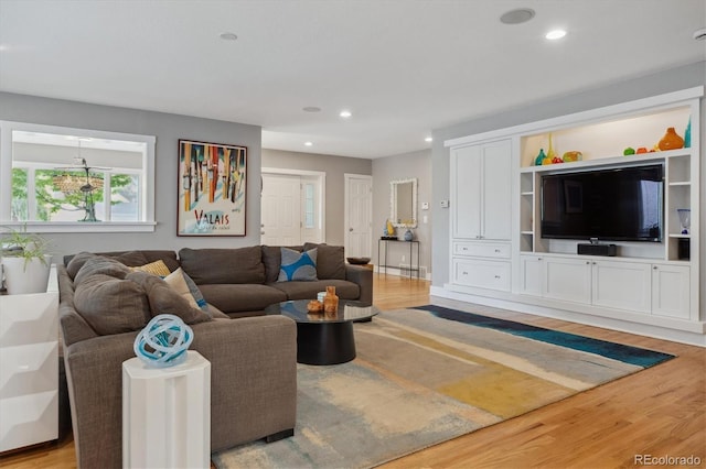 1526 S Gaylord St, Denver, CO 80210 - living area with light wood-style floors and recessed lighting