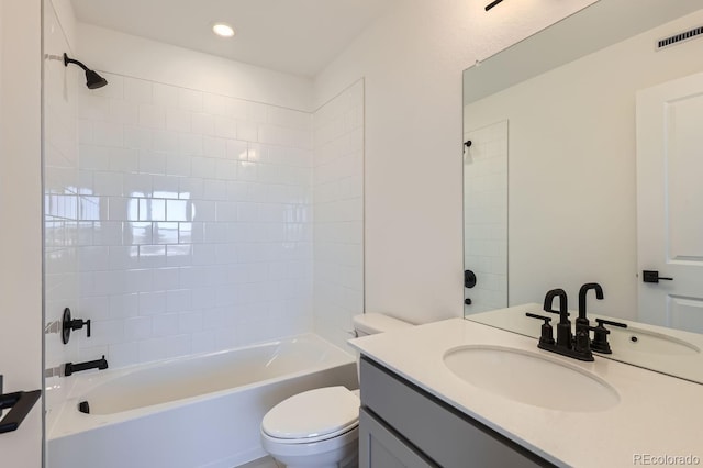 full bathroom featuring toilet, vanity, and shower / bathing tub combination