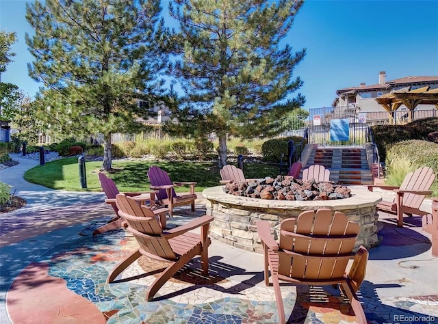 view of patio / terrace featuring a fire pit