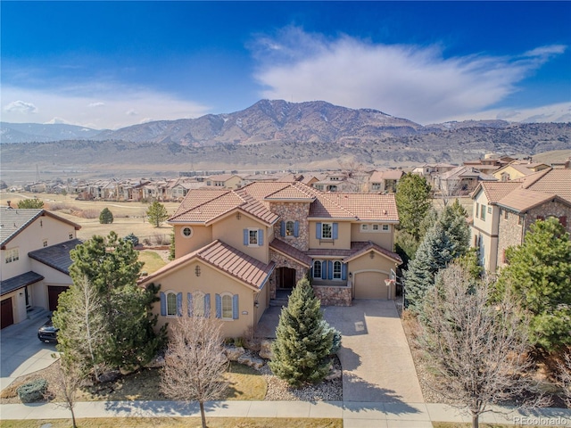 exterior space featuring a residential view and a mountain view