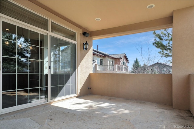 view of patio with a balcony