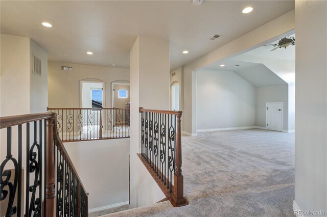 hallway featuring carpet, visible vents, and recessed lighting